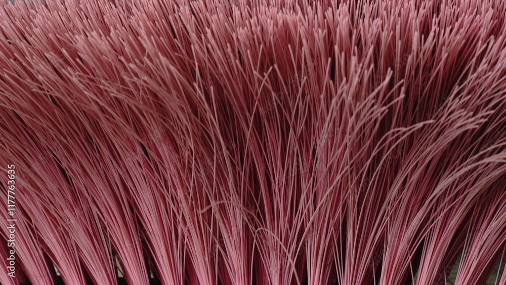 Close up of the texture of plastic fibers arranged on a broom Close up of the texture of plastic fibers arranged on a broom