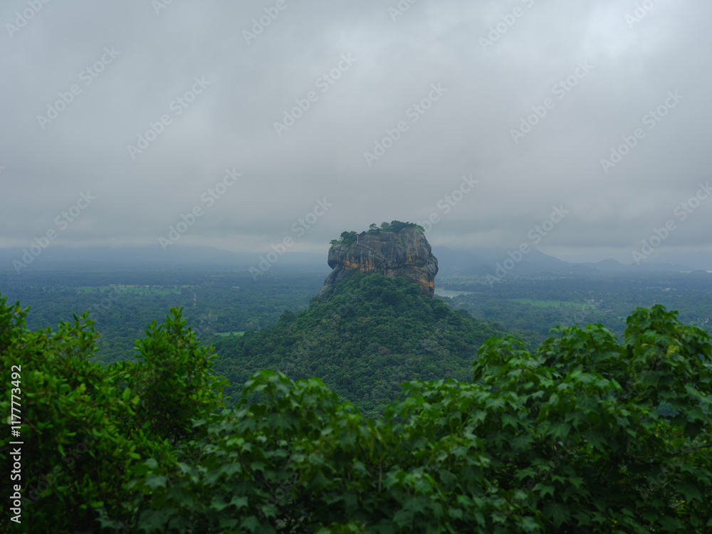 Sigiria Rock surrounded by lush greens in Sri Lanka Sigiria Rock surrounded by lush greens in Sri Lanka