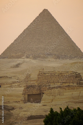 Pyramid of Menkaure at Sunset in Giza Desert with Warm Golden Light Cairo Egypt photo