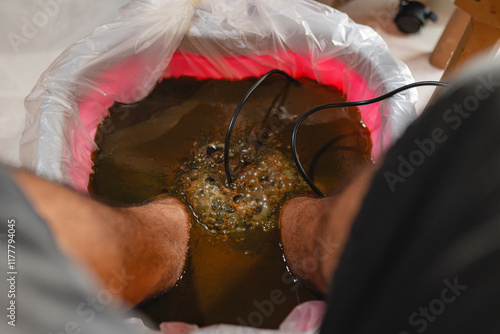 Ugc image of an unrecognizable man undergoing Ionic Detoxification  photo