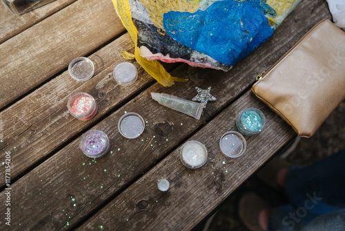 Different glitter on a wooden bench photo