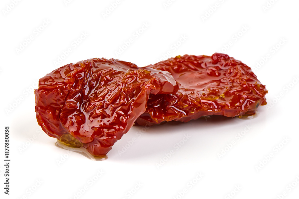 Sun-dried tomatoes isolated on white background. Sun-dried tomatoes isolated on white background.