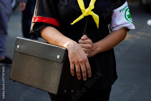 Woman carrying first aid bag photo