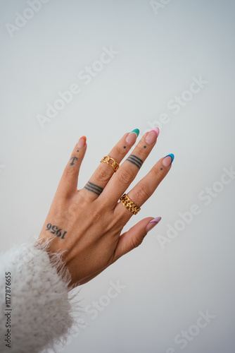 Hand with rings and with a manicure done