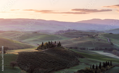 Sunrise over the rolling hills of Val D'Orcia, Tuscany, Italy. photo