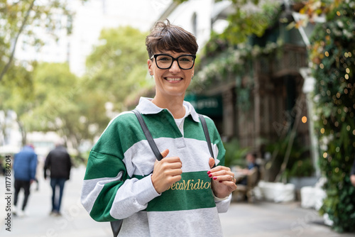 Smiling student walking in manhattan, new york city photo