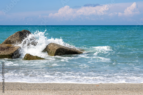 Fototapeta Naklejka Na Ścianę i Meble -  Sand beach with breakwaters, Spadafora, Sicily, Italy