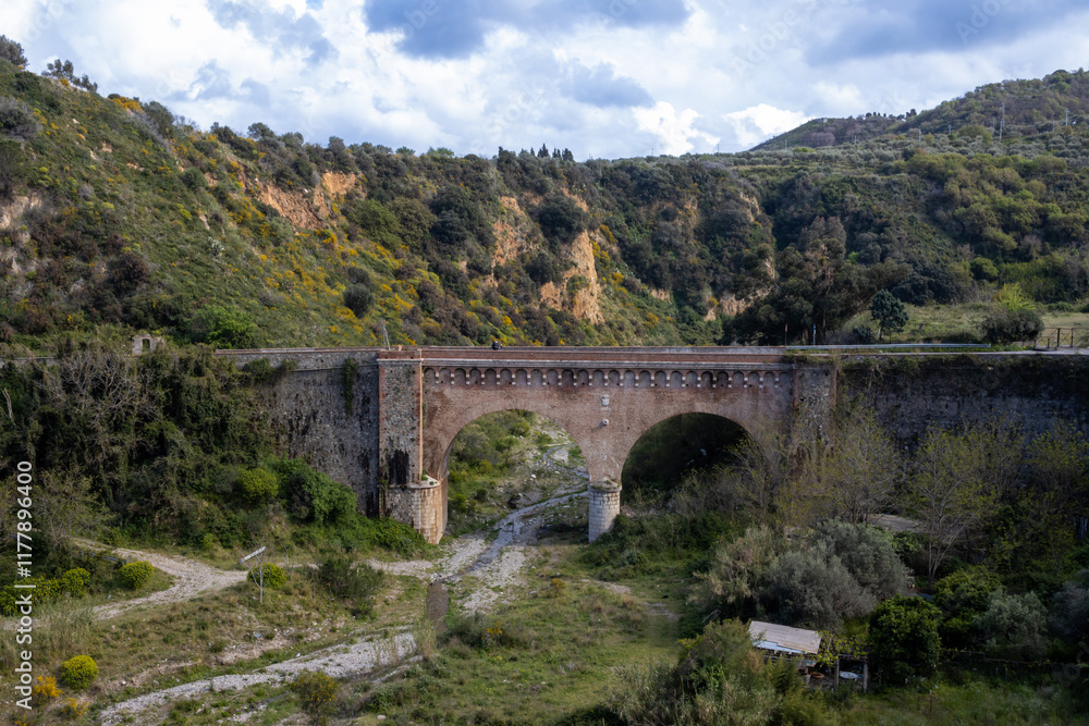 Old bridge and nature, Messina, Sicily, Italy Old bridge and nature, Messina, Sicily, Italy