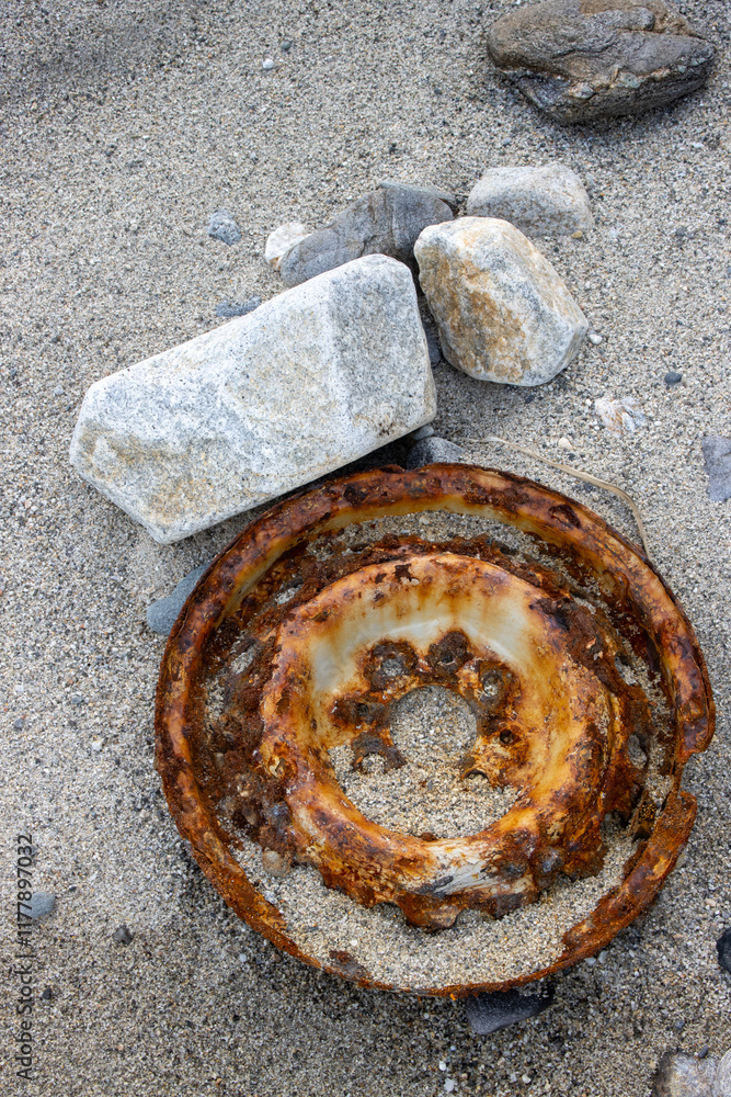 Hubcap washed out rusted from the sea, Italy Hubcap washed out rusted from the sea, Italy