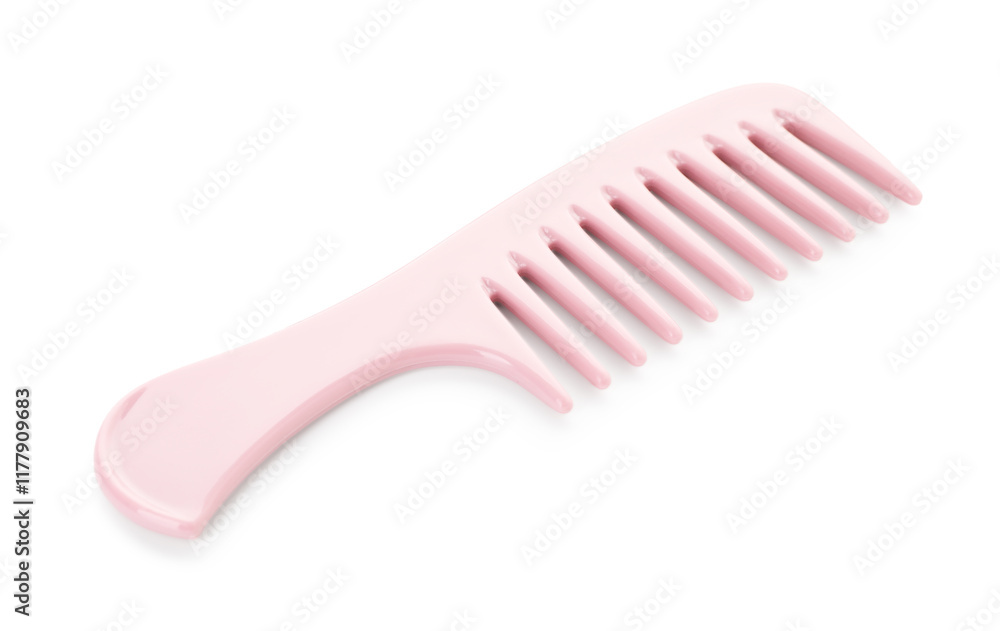 One pink plastic comb isolated on white One pink plastic comb isolated on white