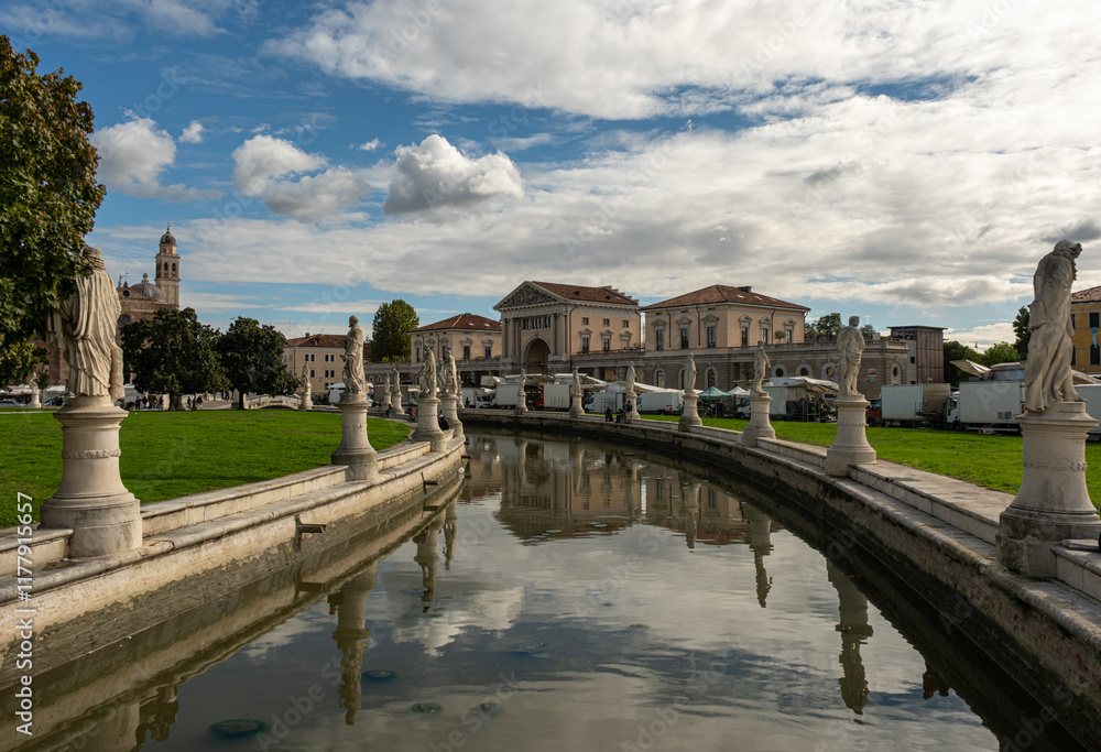 Naklejka premium This video shows a train moving along tracks in an industrial setting, highlighting the link between transportation and industry amidst urban progress