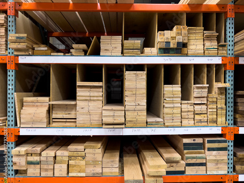 Plank of hardwood on shelf  photo