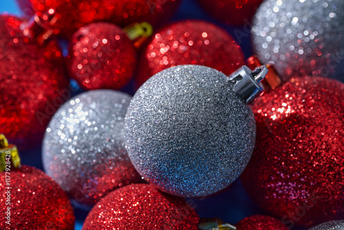 Close-Up of Sparkling Red and Silver Christmas Ornaments photo