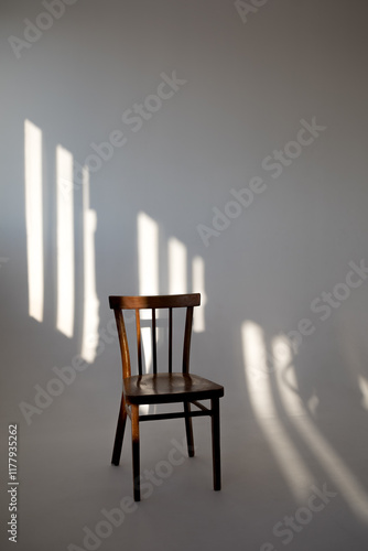 wooden chair on a white background. light and shadow photo