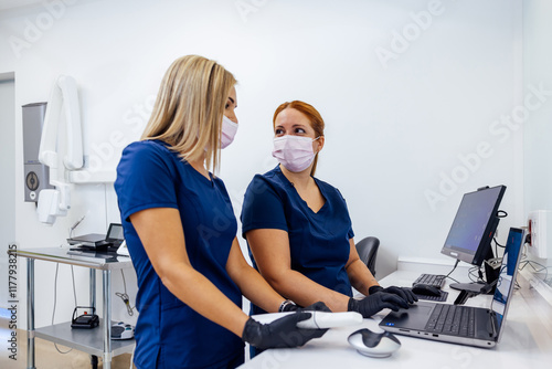 Dental Clinic Professionals Using Technology for Patient Care photo