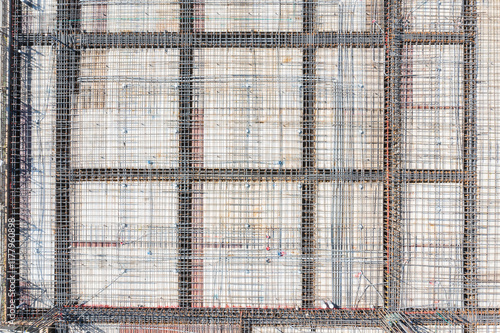 A construction site with exposed steel reinforcement for a concr