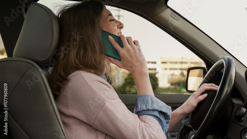 Obraz na płótnie Careless woman talking on mobile phone while driving car w salonie