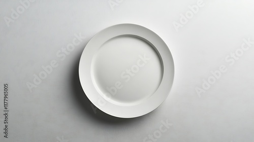 A White Ceramic Plate on a White Surface