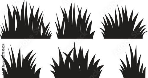Set of black isolated grass silhouettes on white background
