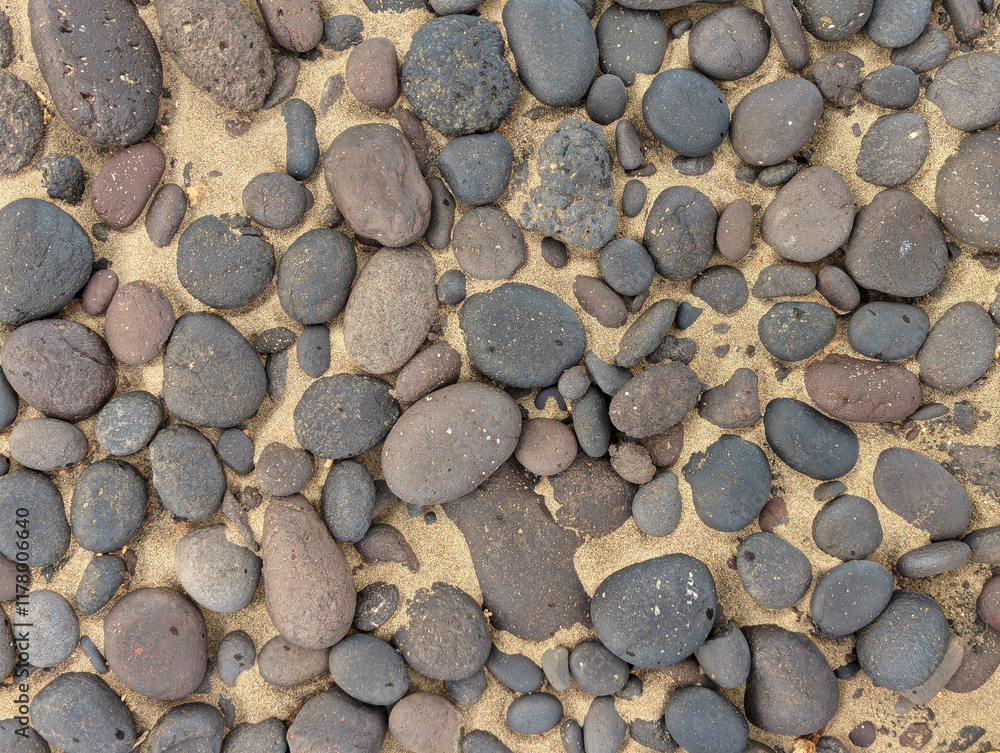 Pattern of pebbles and sand at Famara beach, Lanzarote island, Spain Pattern of pebbles and sand at Famara beach, Lanzarote island, Spain