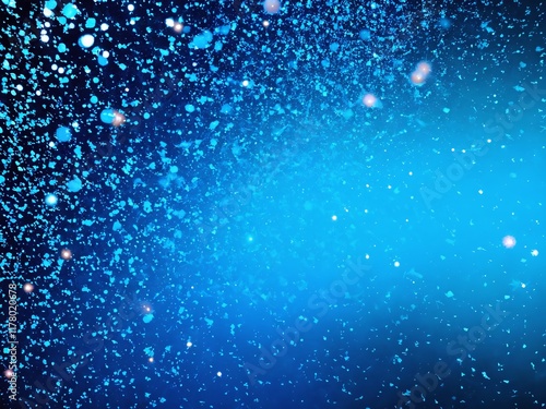 Bright blue particles create a vibrant abstract background filled with light and texture