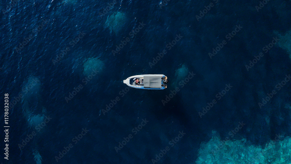 Tiny Boat in Open Waters Tiny Boat in Open Waters