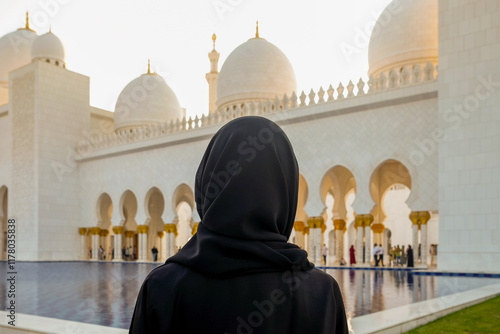 Woman standing in front of Sheik Zayed Mosque
