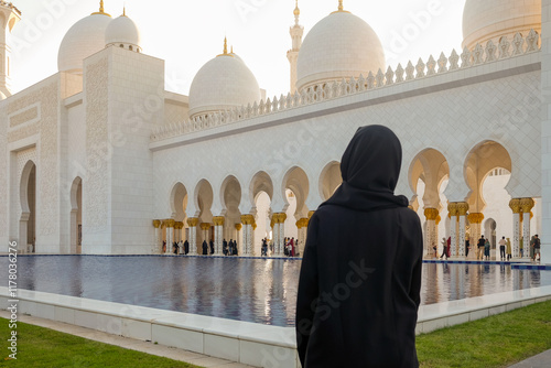 Woman standing in front of Sheik Zayed Mosque
