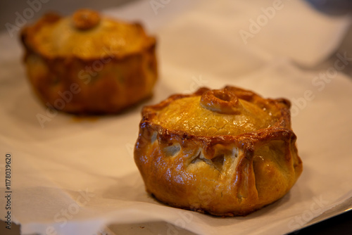 Hand-raised organic pork pies. Organic traditional local UK food. Food photography. photo