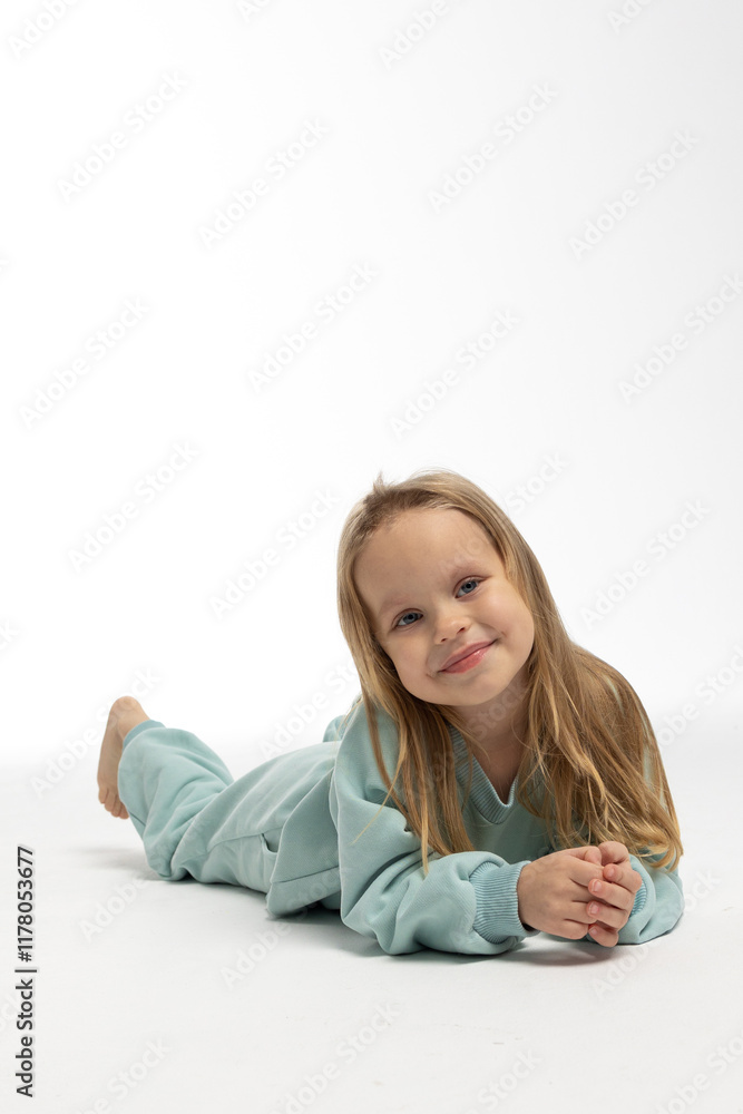 Portrait of beautiful cute little toddler girl. Child with funny face. Pretty smile kid in studio on white background. High quality photo Portrait of beautiful cute little toddler girl. Child with funny face. Pretty smile kid in studio on white background. High quality photo