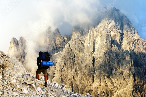 Dolomiti di Sesto and hiker, Alps Dolomites mountains photo