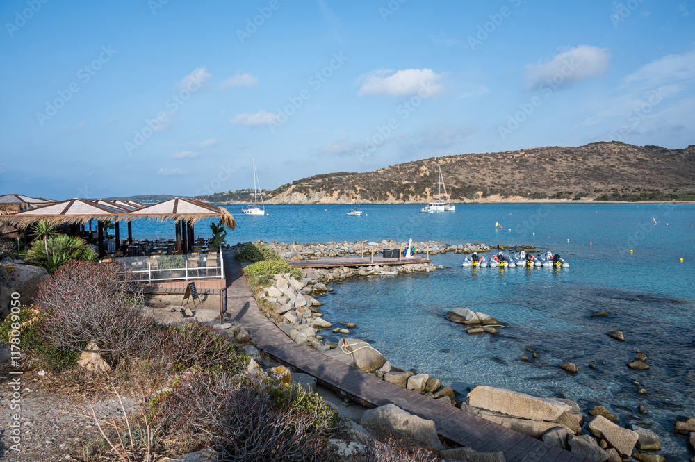 Fototapeta premium Villasimius, italy - 09-03-2024: The beautiful beach of Punta Molentis in Villasimius with white sand and turquoise water