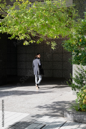 Businessman enters the company photo