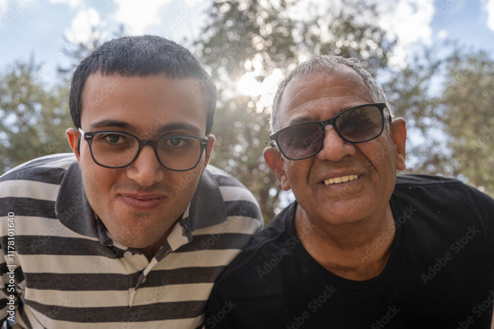 Bonding Moment Between Father and Son During a Sunny Day Bonding Moment Between Father and Son During a Sunny Day