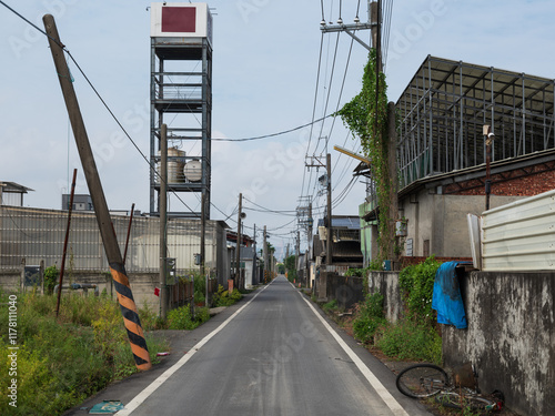 Narrow street in Pingtung District of Taiwan. Farming area. photo