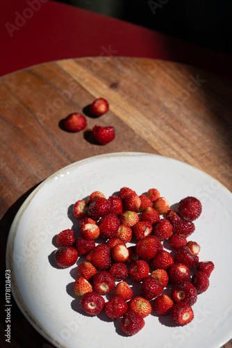 Fresh Nemi Wild Strawberries on a Rustic Wooden Table