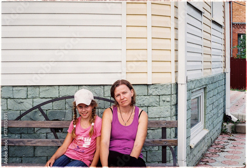 Mom and daughter on a bench