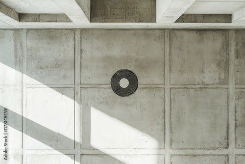 Aerial perspective of a concrete ceiling and fan in a building s interior photo