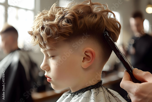 Young Boy Getting a Haircut at the Barbershop