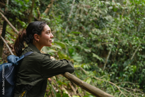 Traveler Woman Enjoying Nature in the jungle photo