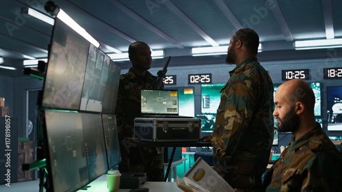 Canvastavla Military officer using tracking software on laptop to gain info helpful against enemies