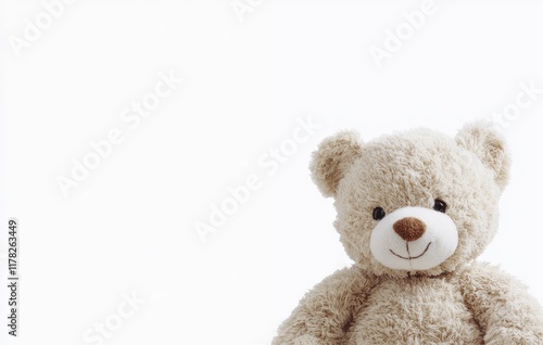 Cute brown teddy bear isolated on a white background with copy space, suitable for banner design. Stock photo, high quality. 