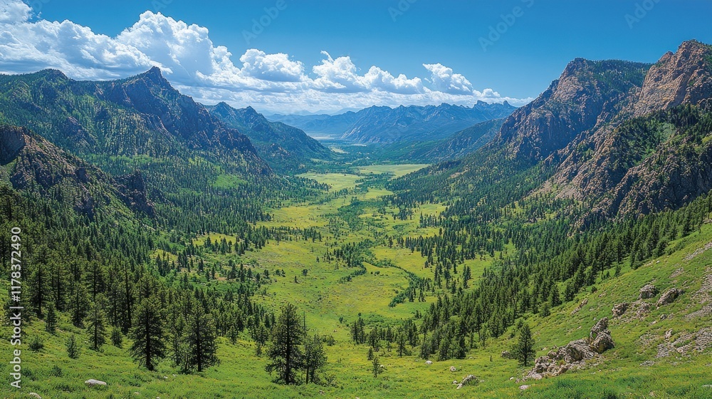 Fototapeta premium A breathtaking valley scene with mountains, lush greenery, and a clear blue sky.