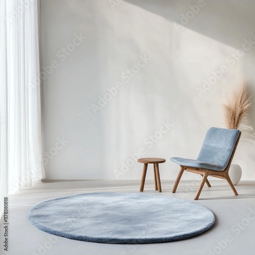 Minimalist room with round rug, chair, and side table. photo