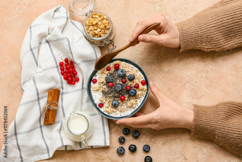Female hands with tasty oat...