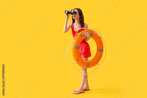 Female lifeguard with rescu...
