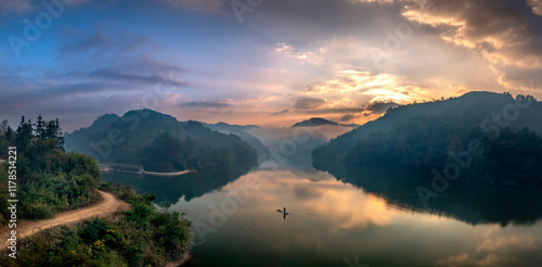 Fototapeta Naklejka Na Ścianę i Meble -  Sunrise on Ban Viet Lake in Cao Bang Province, Vietnam