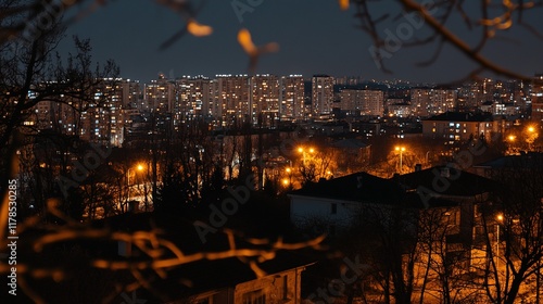 Darkened homes contrasting lit buildings in urban landscape, symbolizing disparity and the contrast between light and darkness in modern society. photo