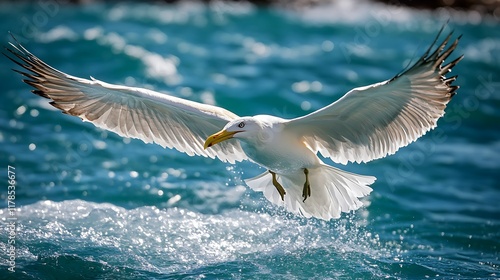 Seagull flying over ocean waves.
