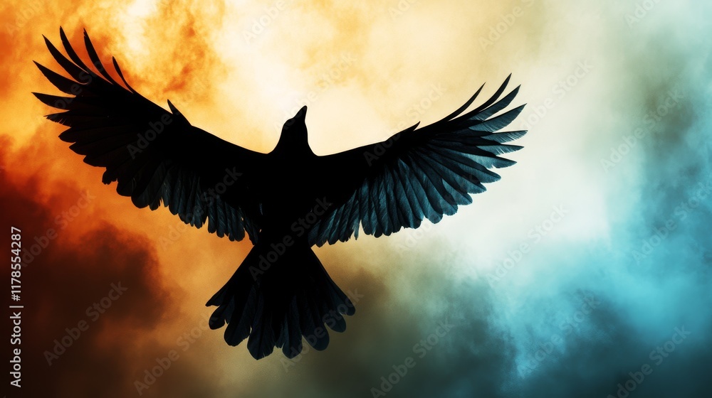 Fototapeta premium A stunning silhouette of a bird in flight, set against a backdrop of vibrant clouds in sunset colors, symbolizing freedom and natural beauty.